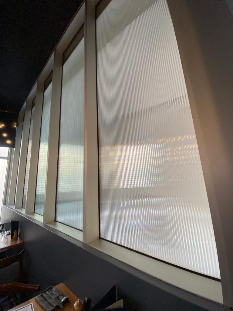 Decorative tinted windows in cafe